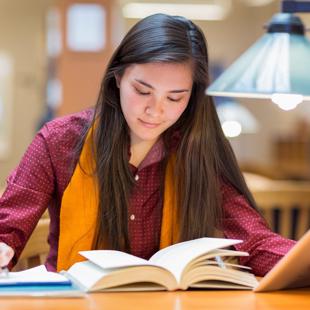 Person reading a text book