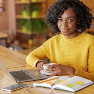 Person studying with a laptop